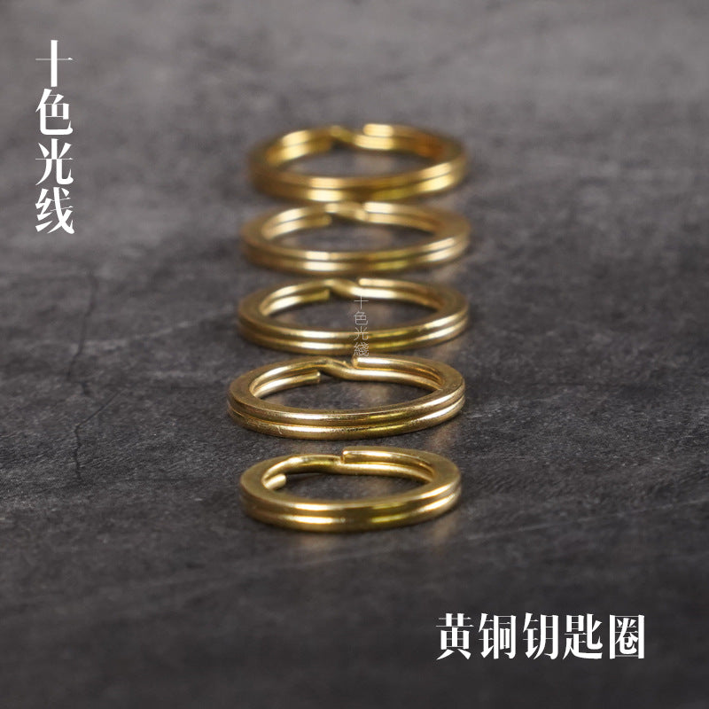 Solid brass key rings, stacked close-up of round metal loops