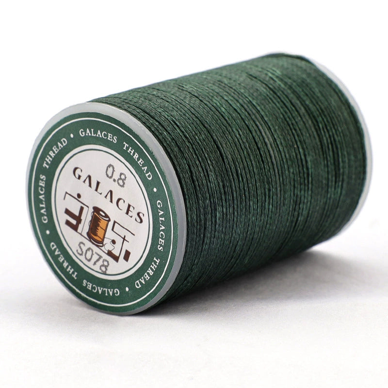 Dark green flat waxed polyester thread spool, 0.8mm wax cord
