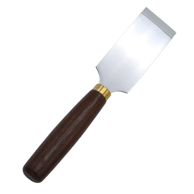 Leather skiving knife with dark walnut handle and wide curved steel blade