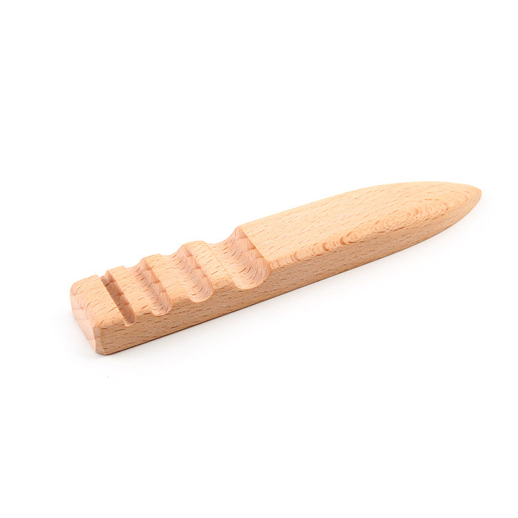 Beech wood edge burnisher with scalloped grip and pointed polishing tip