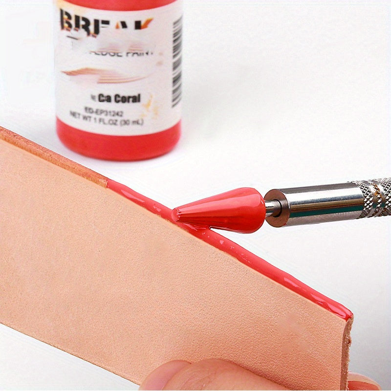 Leather edge oil pen with red applicator, spreading oil along tan leather edge