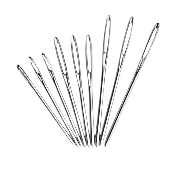 Nine stainless sewing needles with large blunt eyes fanned out