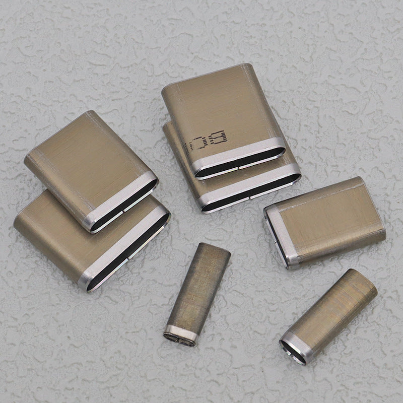Mixed-size oblong slot punch die set with stainless steel blocks and black cutting faces