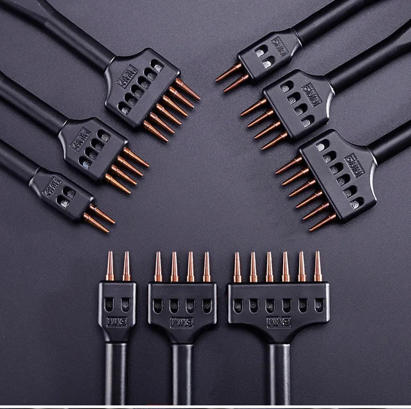 Black hole punch tool heads with copper prongs and perforated slots, multi-size set