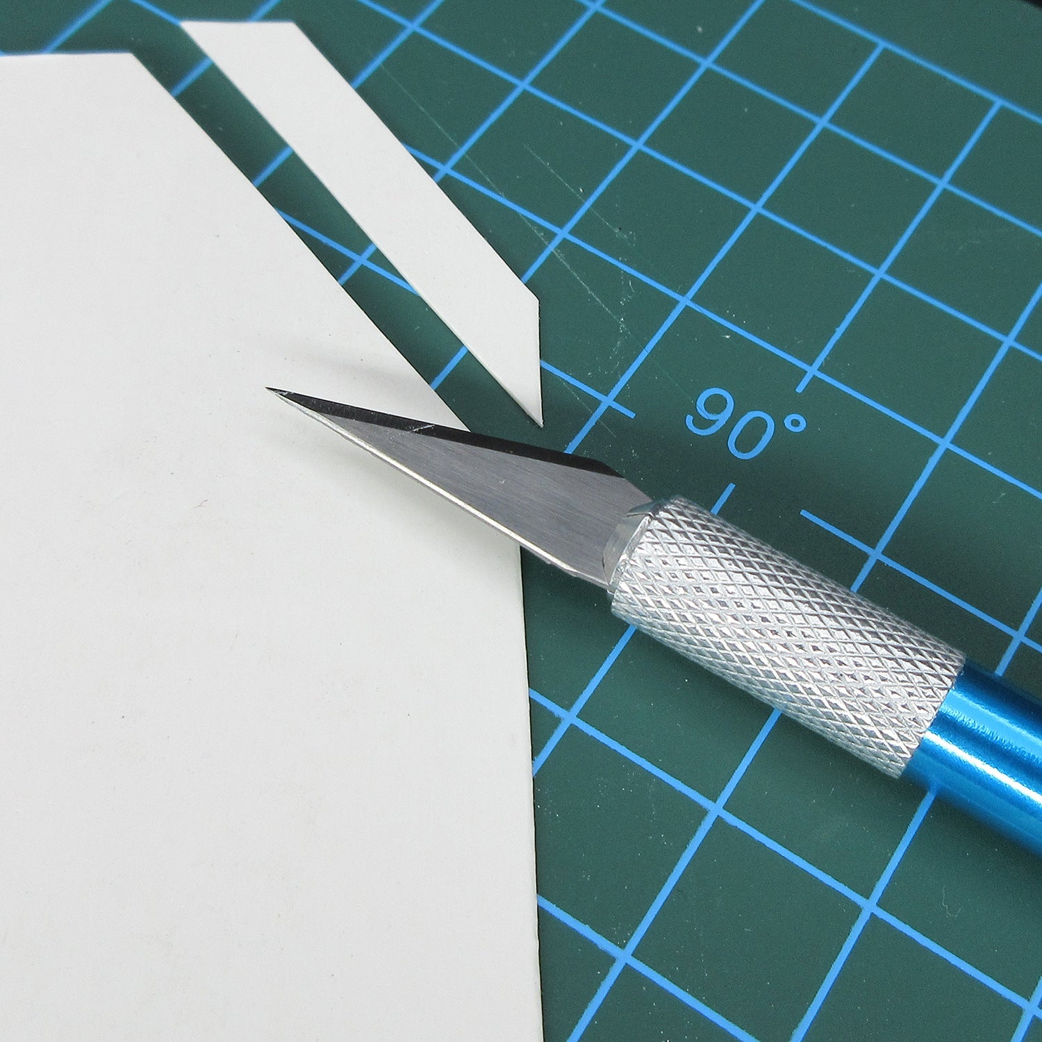 Blue-handled No.11 precision craft knife with metal blade tip