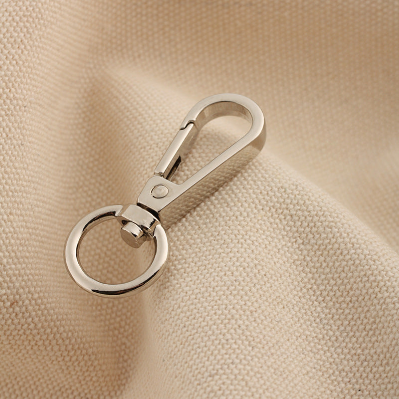 Silver swivel lobster claw bag hook buckle with oval ring and locking lever