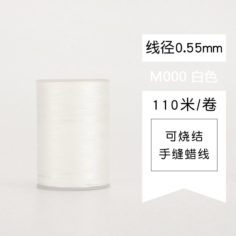 Waxed leather stitching thread spool with off-white thread
