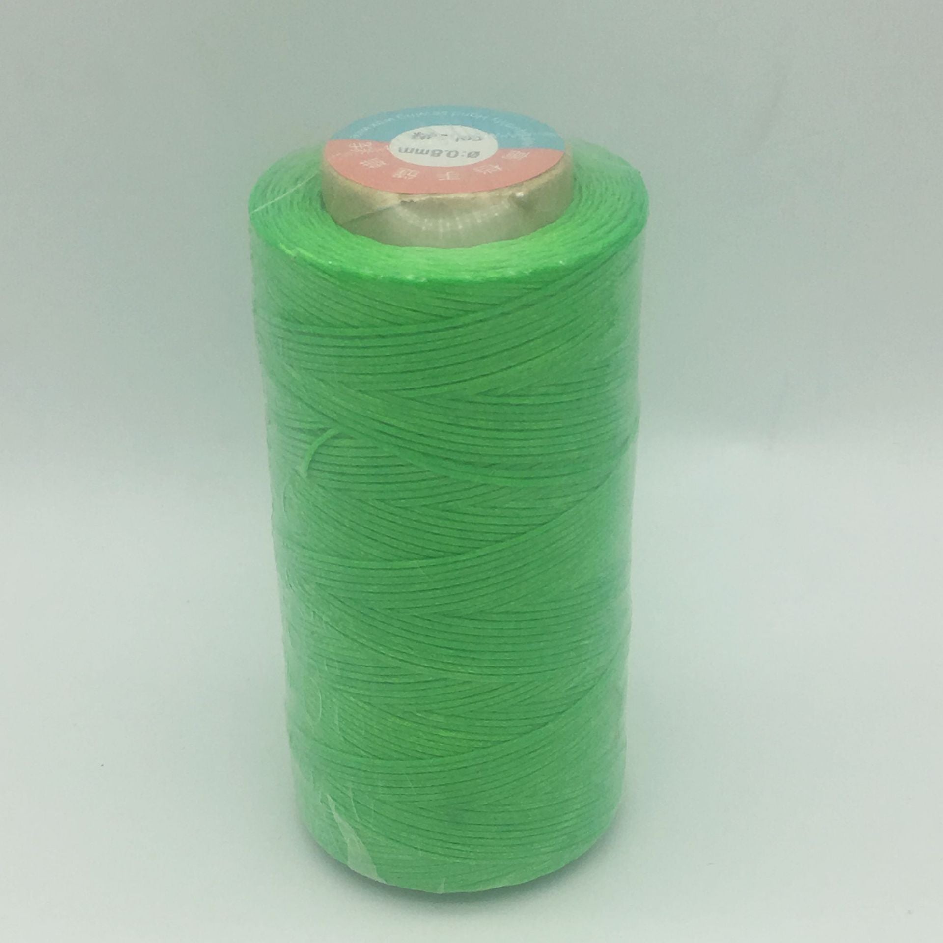 Waxed polyester sewing thread spool, bright green, 150D flat thread