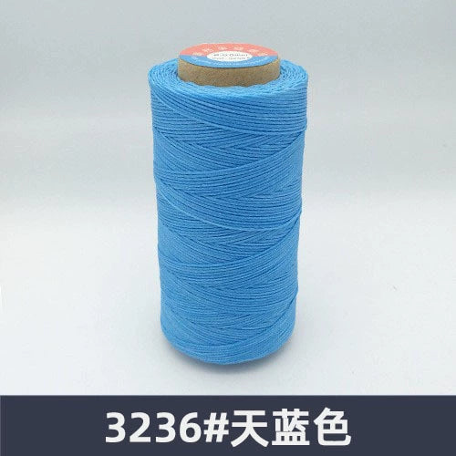 Waxed polyester sewing thread spool, bright sky blue