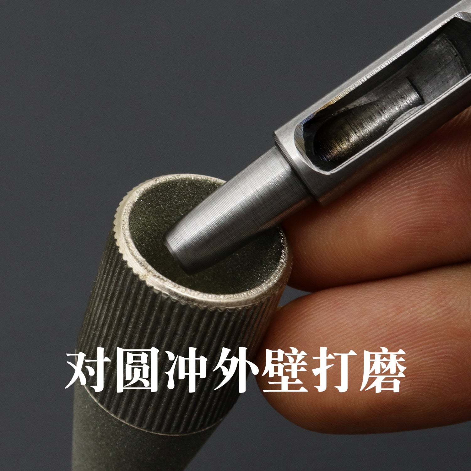 Tapered emery grinder head with ribbed surface and pointed shaft
