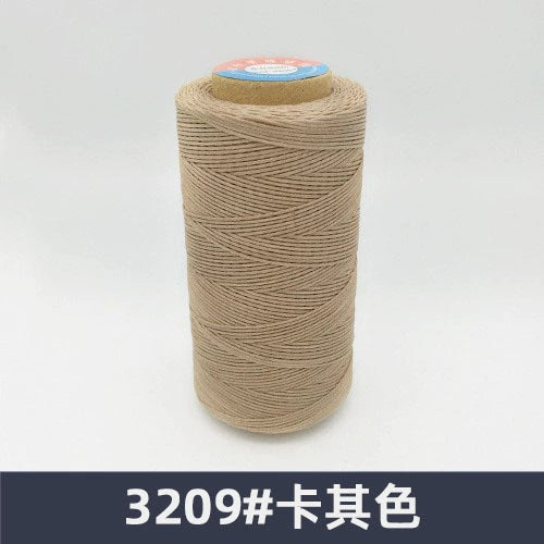 Waxed polyester sewing thread spool, beige khaki color