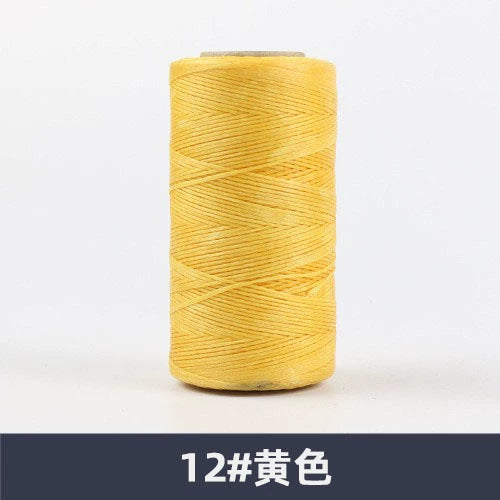 Waxed polyester sewing thread spool, yellow, flat 150D, 260 m