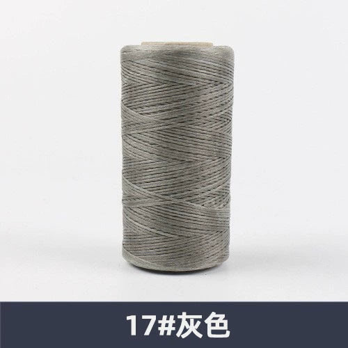 Waxed polyester sewing thread spool, gray, flat 150D, 260 m