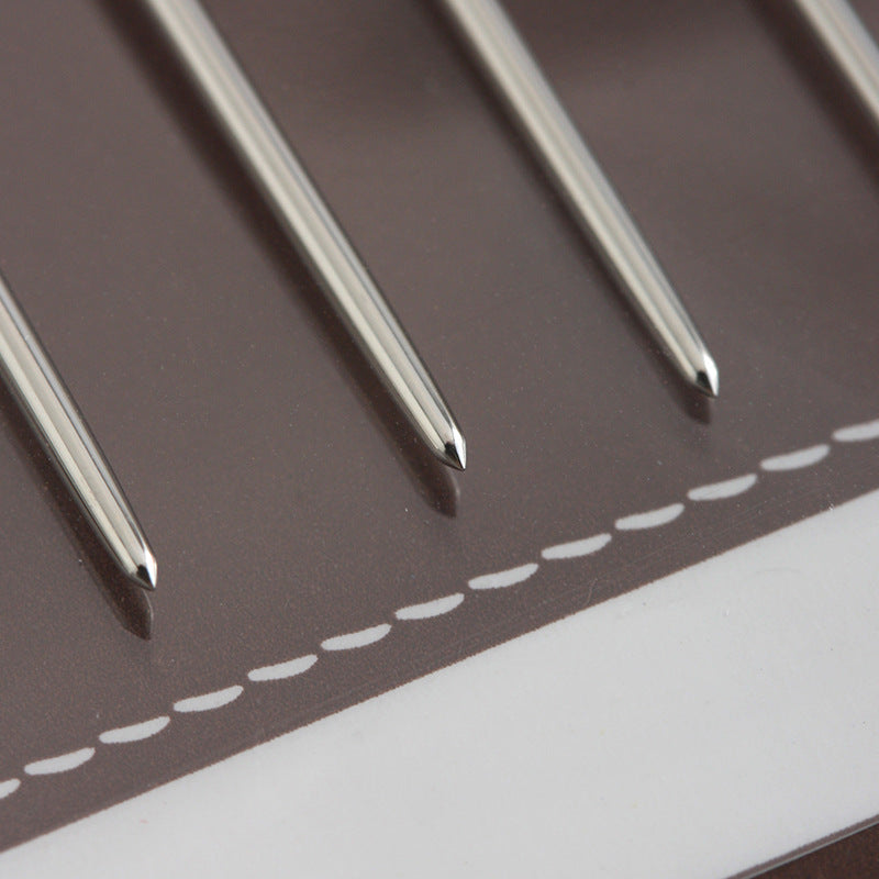 Blunt round-point sewing needles with metal shafts on backing card