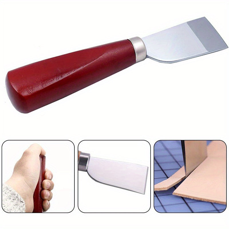 Leather cutting knife with red wooden handle and wide curved steel blade
