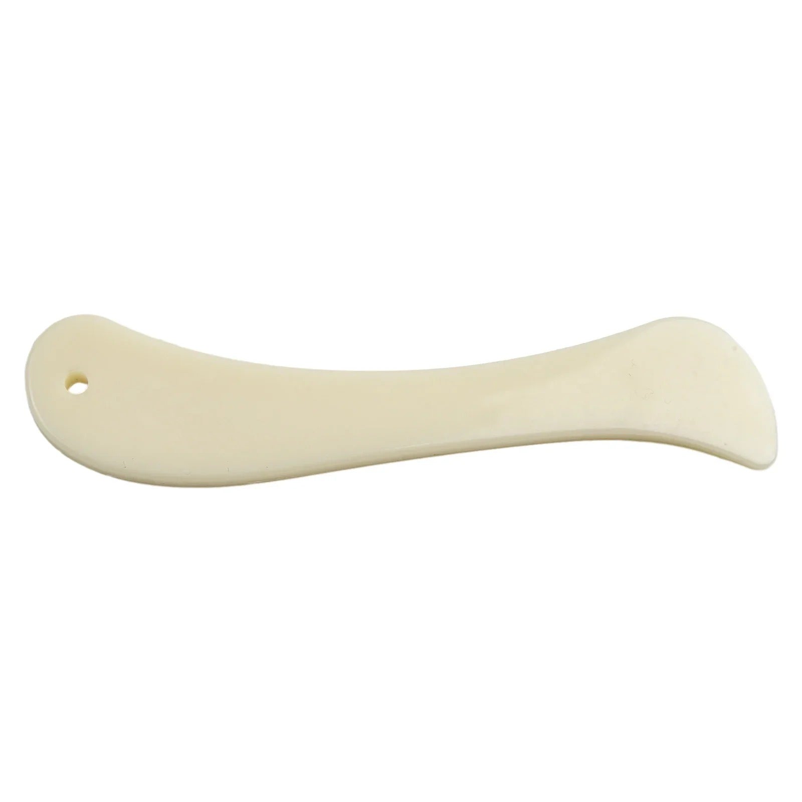 Cream leather bone folder tool with curved blade and small hole at end