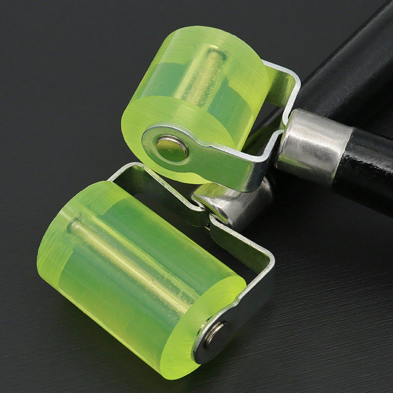 Dual silicone glue roller heads in lime green with metal clips and black handles