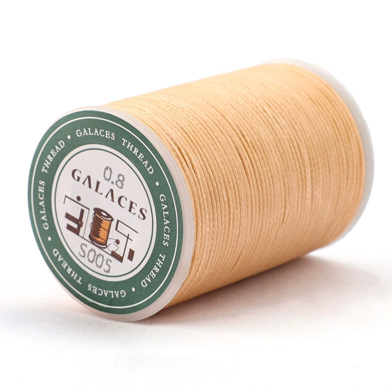Beige flat waxed polyester thread spool, 0.8mm wax cord