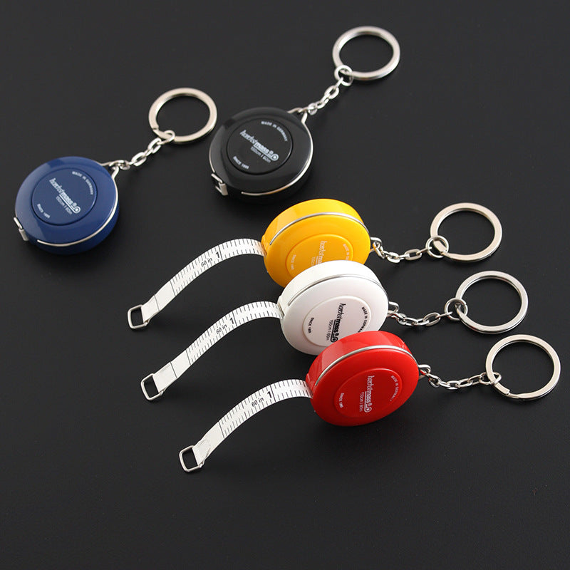 Retractable soft tape measure keychains with extended tapes in blue yellow white red