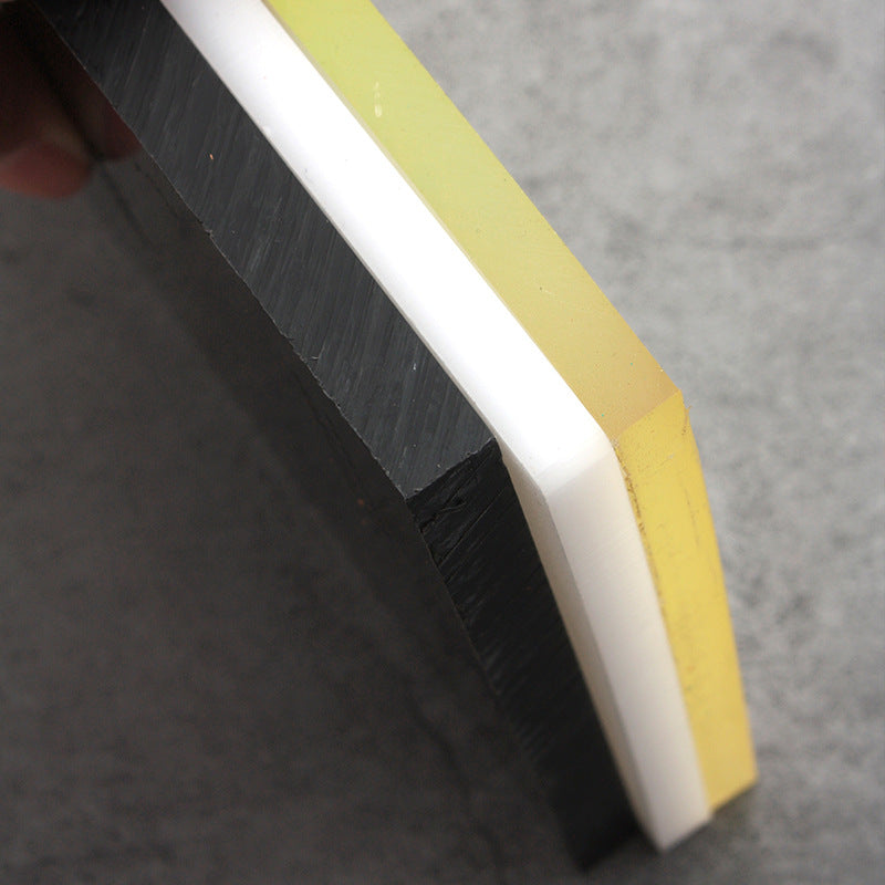 Close-up of black nylon backing pad edge with layered pale border