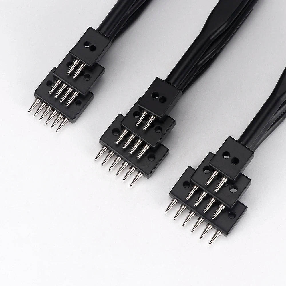 Three leather stitching hole punch tools with black heads and sharp metal prongs