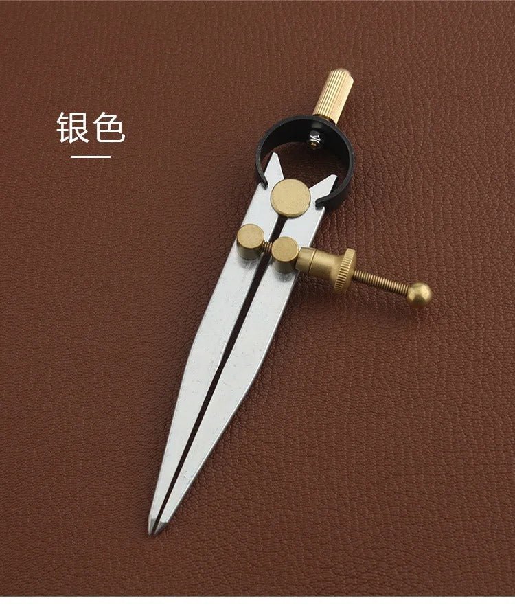 Wing divider with lockable adjustment, silver legs with brass knobs and black fittings