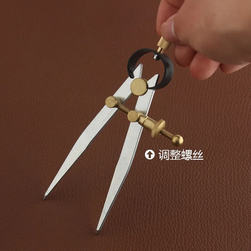 Wing divider tool with lockable adjustment, brass fittings and silver pointed legs