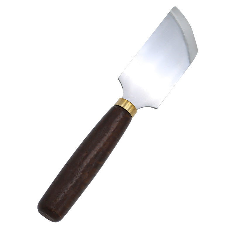 Leather skiving knife with dark walnut handle and curved steel skiving blade