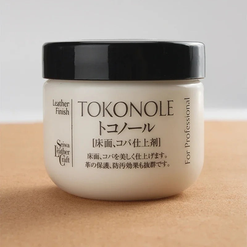 Clear leather finish cream jar with black lid