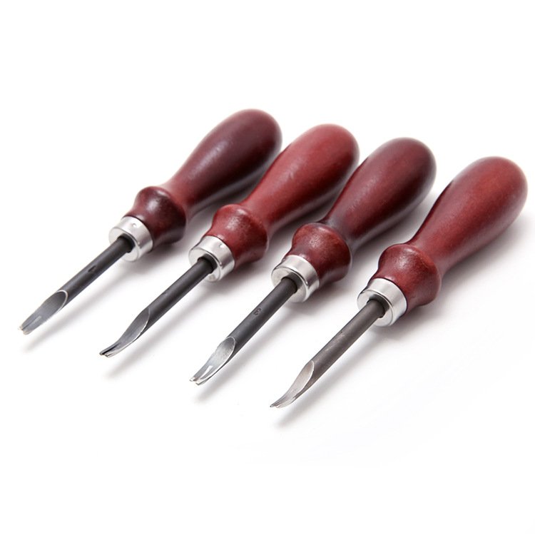Set of leather edge bevelers with red wooden handles and steel blades