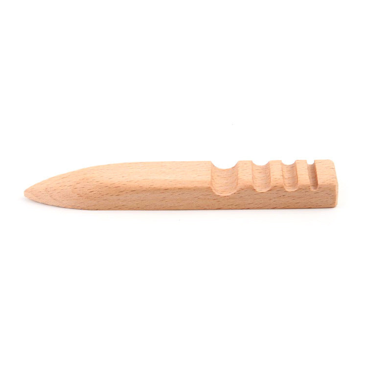 Beech wood edge burnisher tool with grooved polishing section, side view