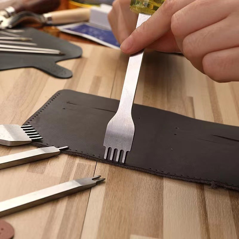 Leather stitching diamond chisel tool held by hand for punching stitch holes