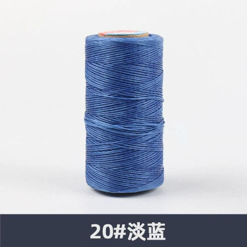 Waxed polyester sewing thread spool, medium light blue