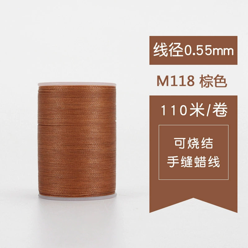 Waxed leather stitching thread spool with medium brown thread