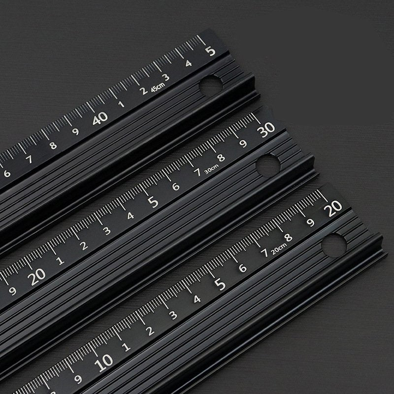 Set of black T-type protective rulers with clear measurement scales and circular tabs