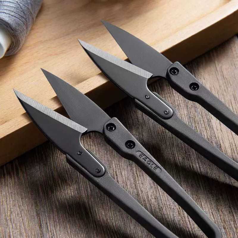 Thread nippers with U-shaped gray blades and Eagle logo handles
