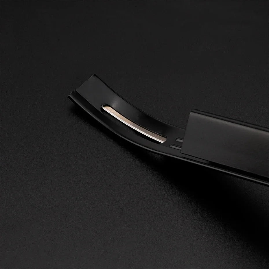 Black leather safety beveler with curved blade guard and slot