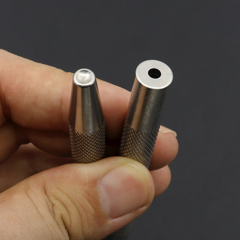 Handheld view of two metal rivet setter heads with textured grip barrels