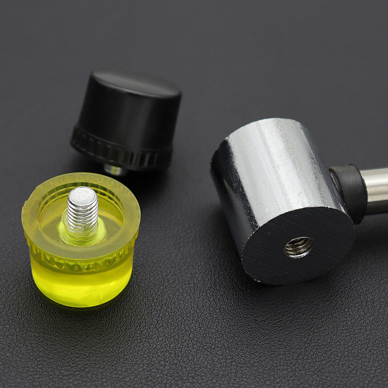 Interchangeable rubber faces and steel hammer heads with black collars and yellow accents