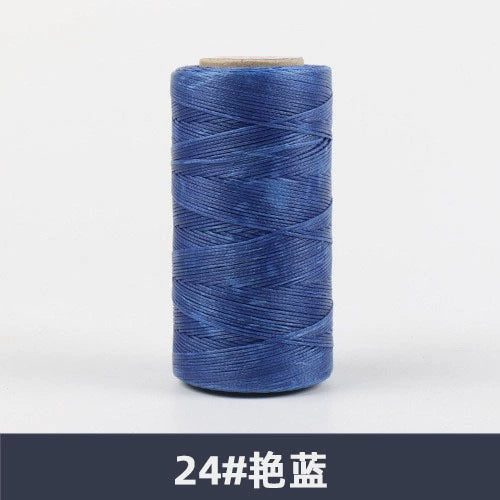 Waxed polyester sewing thread spool, deep blue