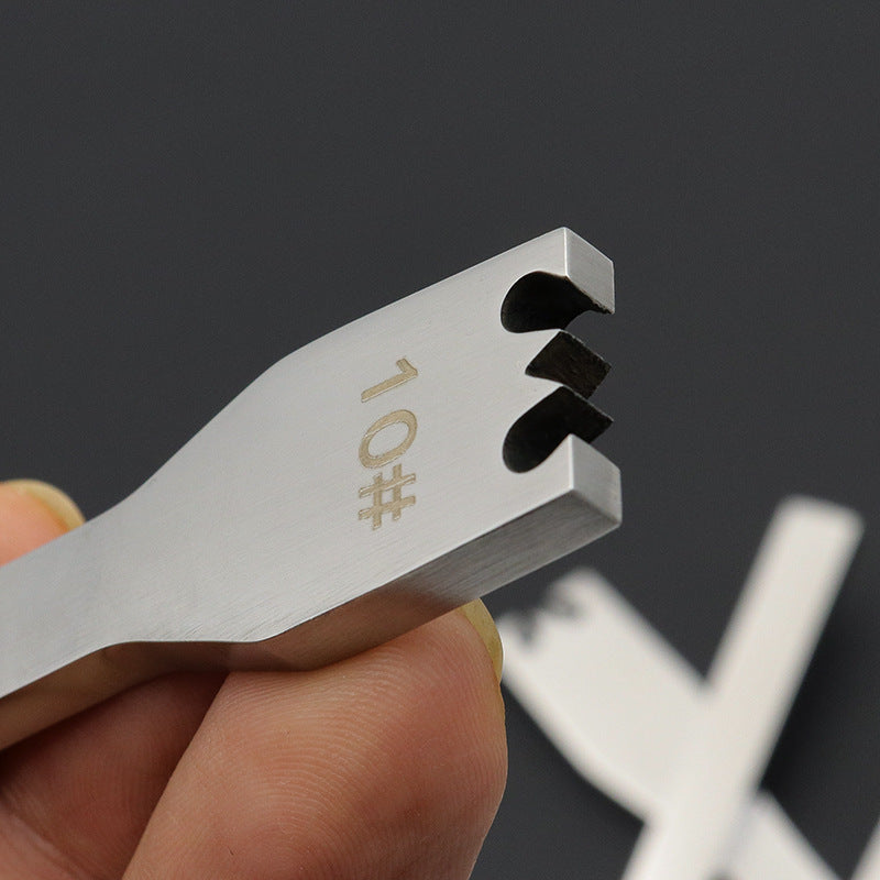 Stainless steel 10# zipper tooth detacher tool held in hand, with notched jaws