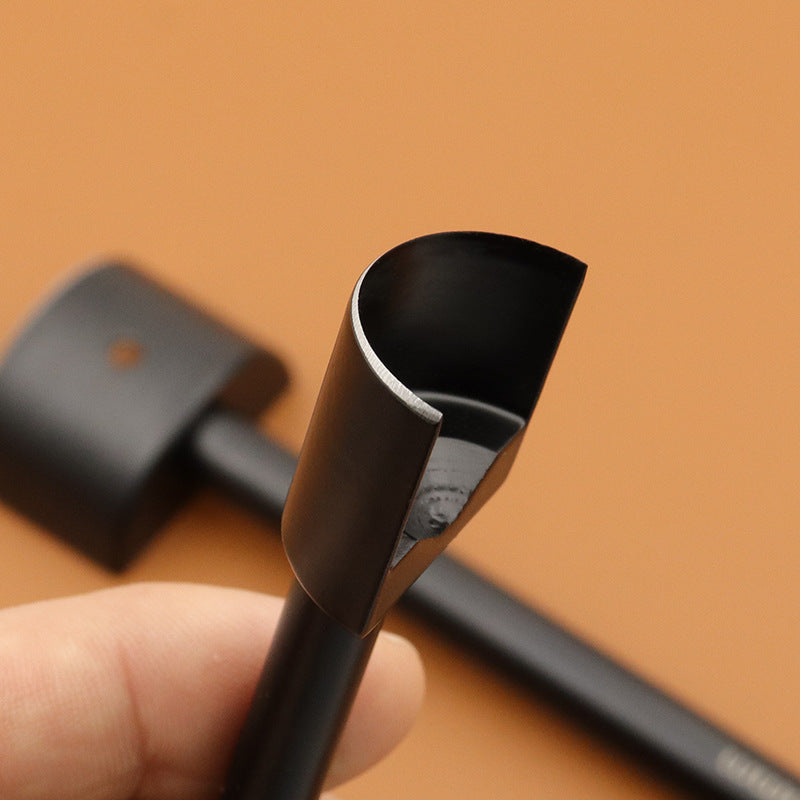 Leather strap end punch tip with semi-circular cutting channel and black handle