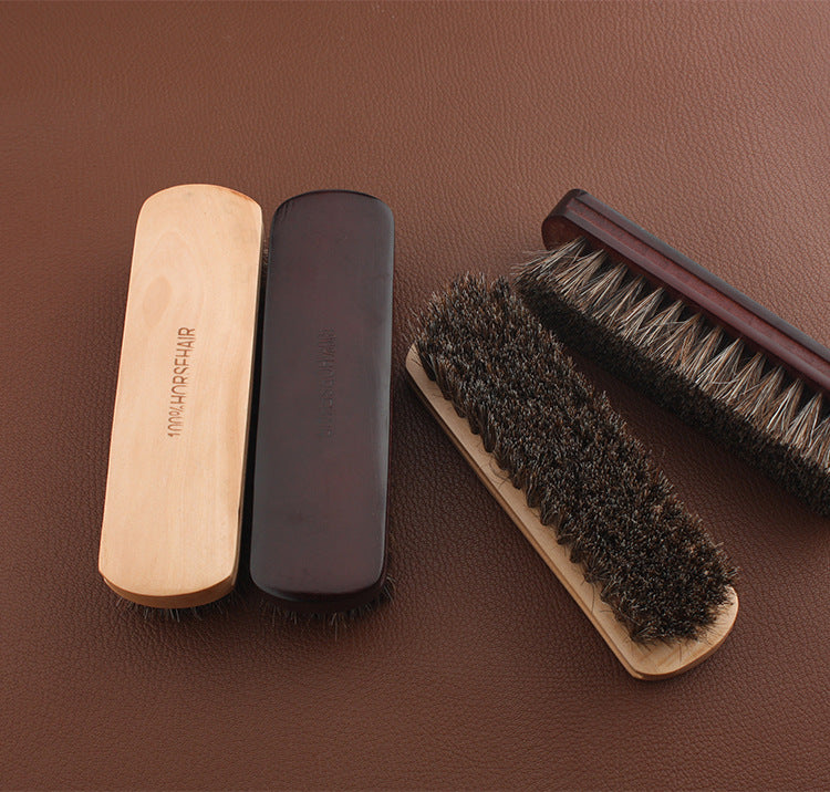 Set of three horsehair leather brushes with wooden and dark handles, dense bristles