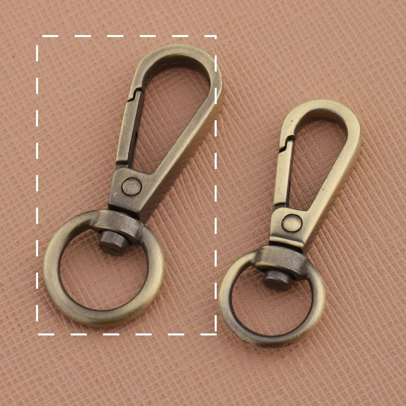 Swivel lobster claw hook buckle hardware, two antique gunmetal-tone hooks with swivel rings