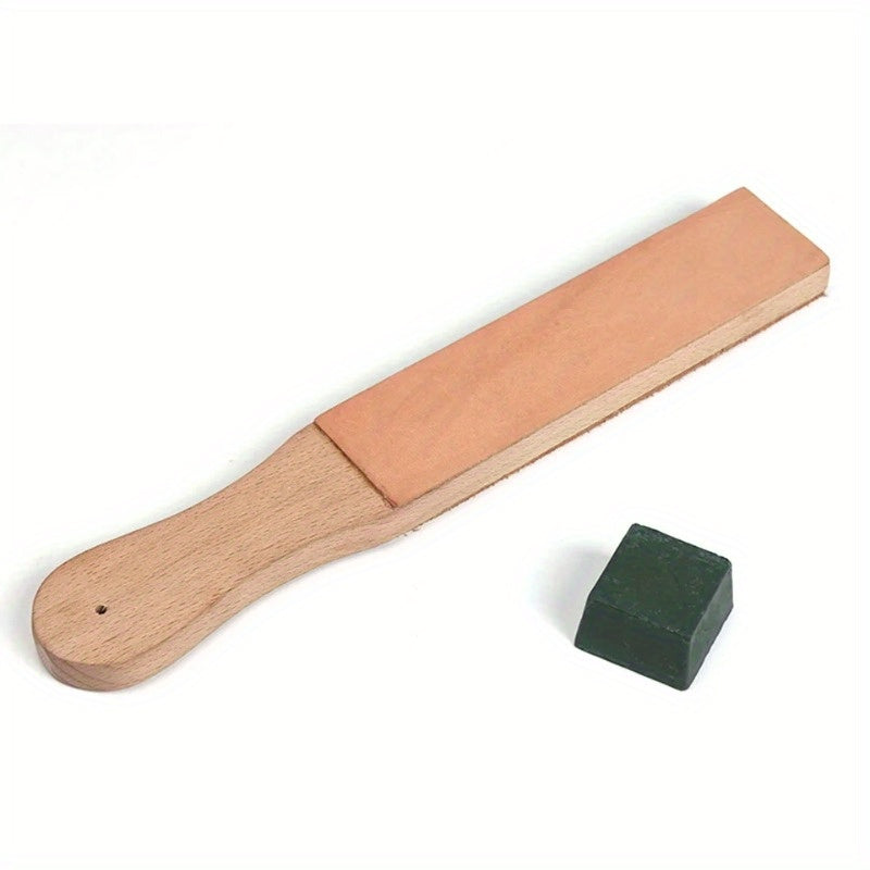 Wood-handled leather strop with tan abrasive pad and green compound block