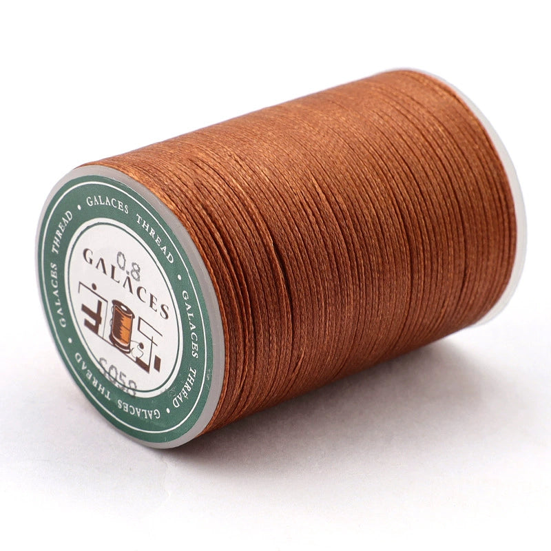 Brown flat waxed polyester thread spool, 0.8mm wax cord