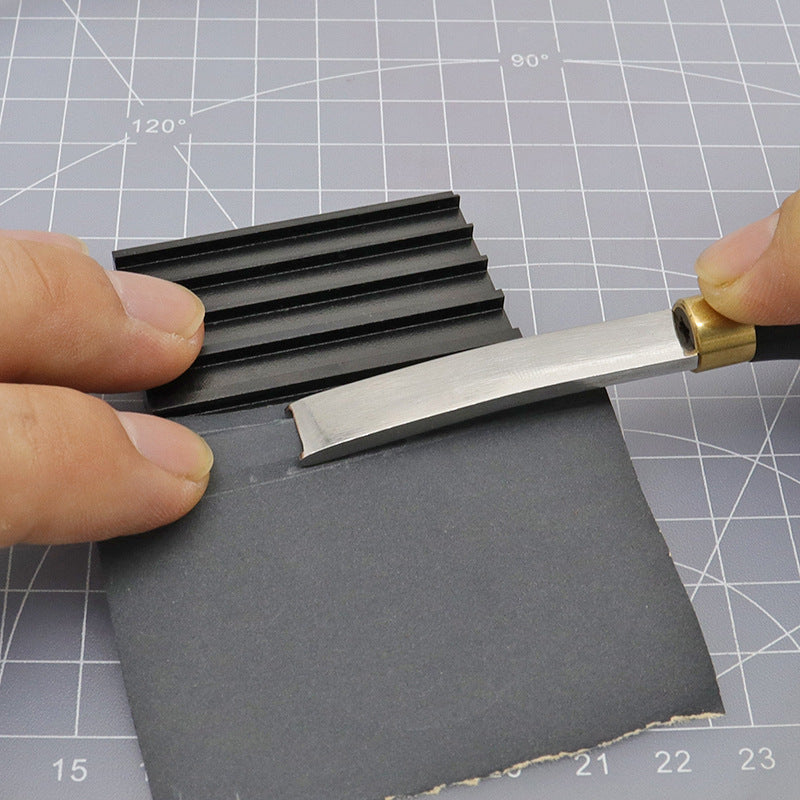 Knife sharpener insert held on board with metal guide blade and hand grip