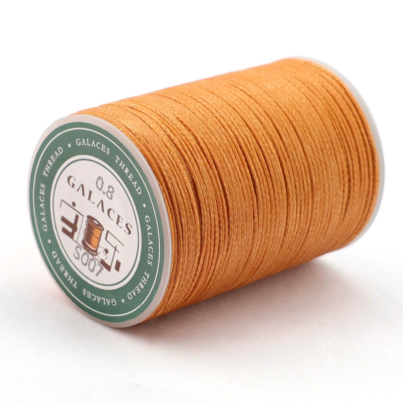 Orange flat waxed polyester thread spool, 0.8mm wax cord