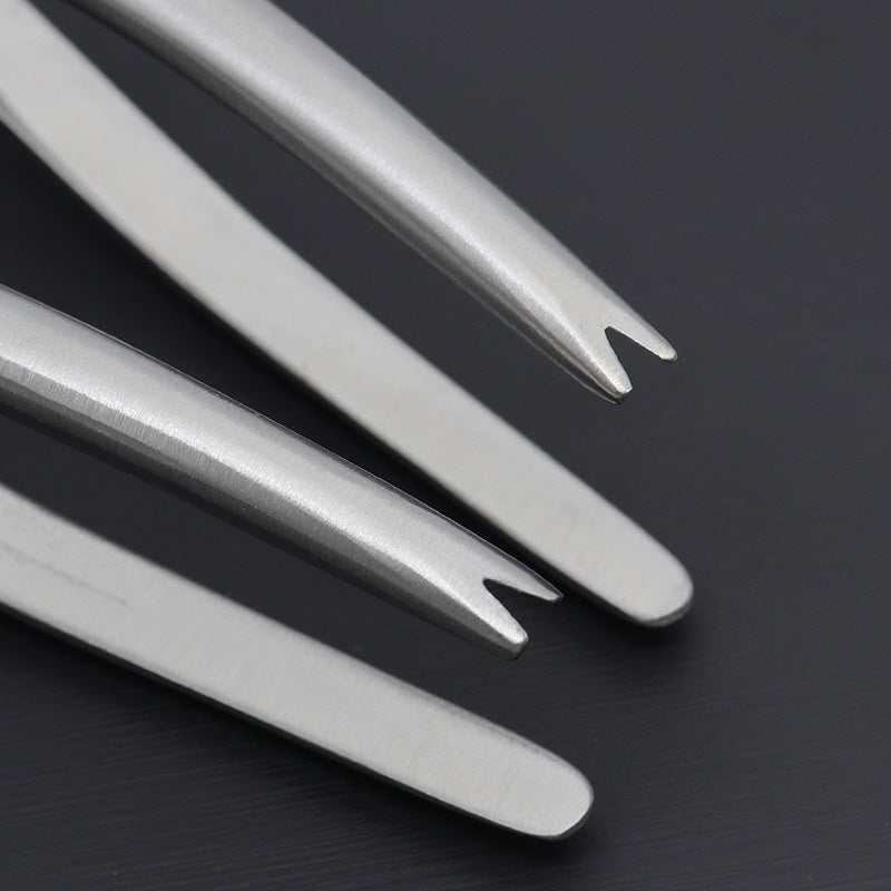 Bird-nose pliers close-up of slim metal tips and serrated gripping edges
