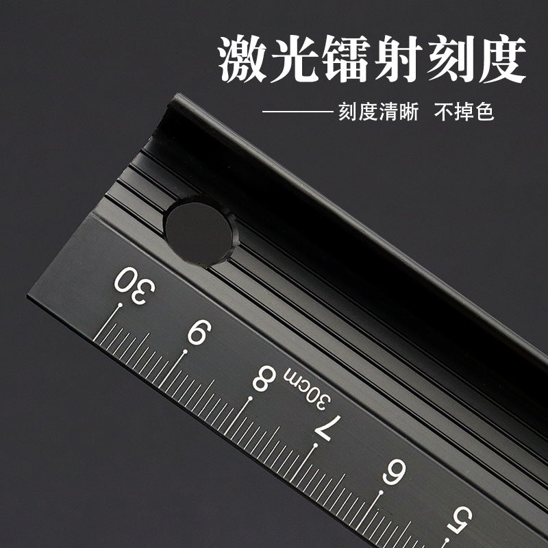 Black T-type ruler showing fine measurement scale and circular hole detail